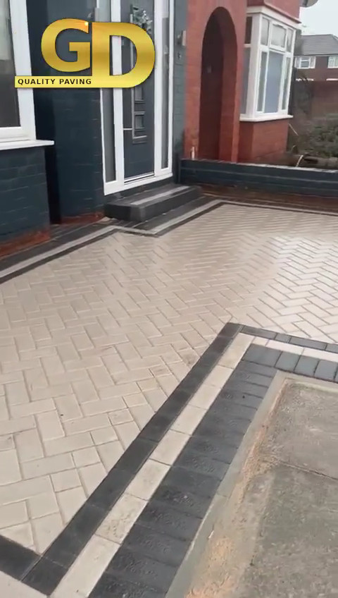 Light grey blockwork car parking area in Birkenhead.